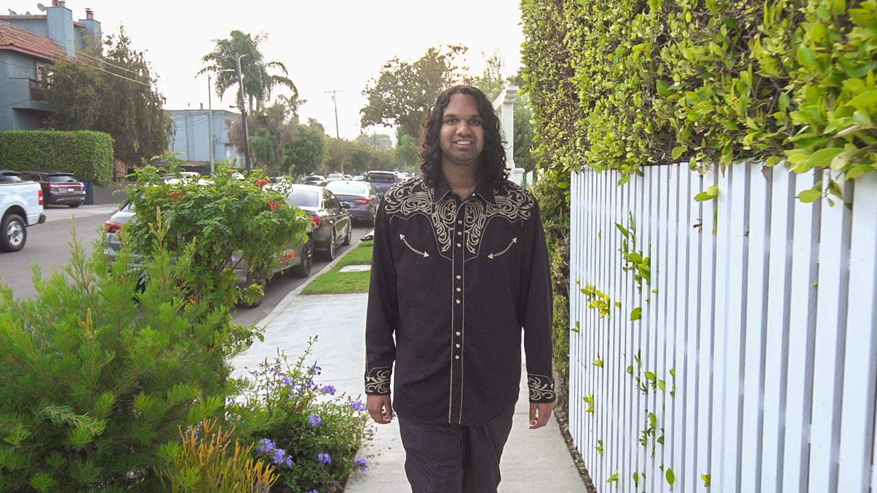 Shri Ganeshram, Awning.com founder, on a sidewalk